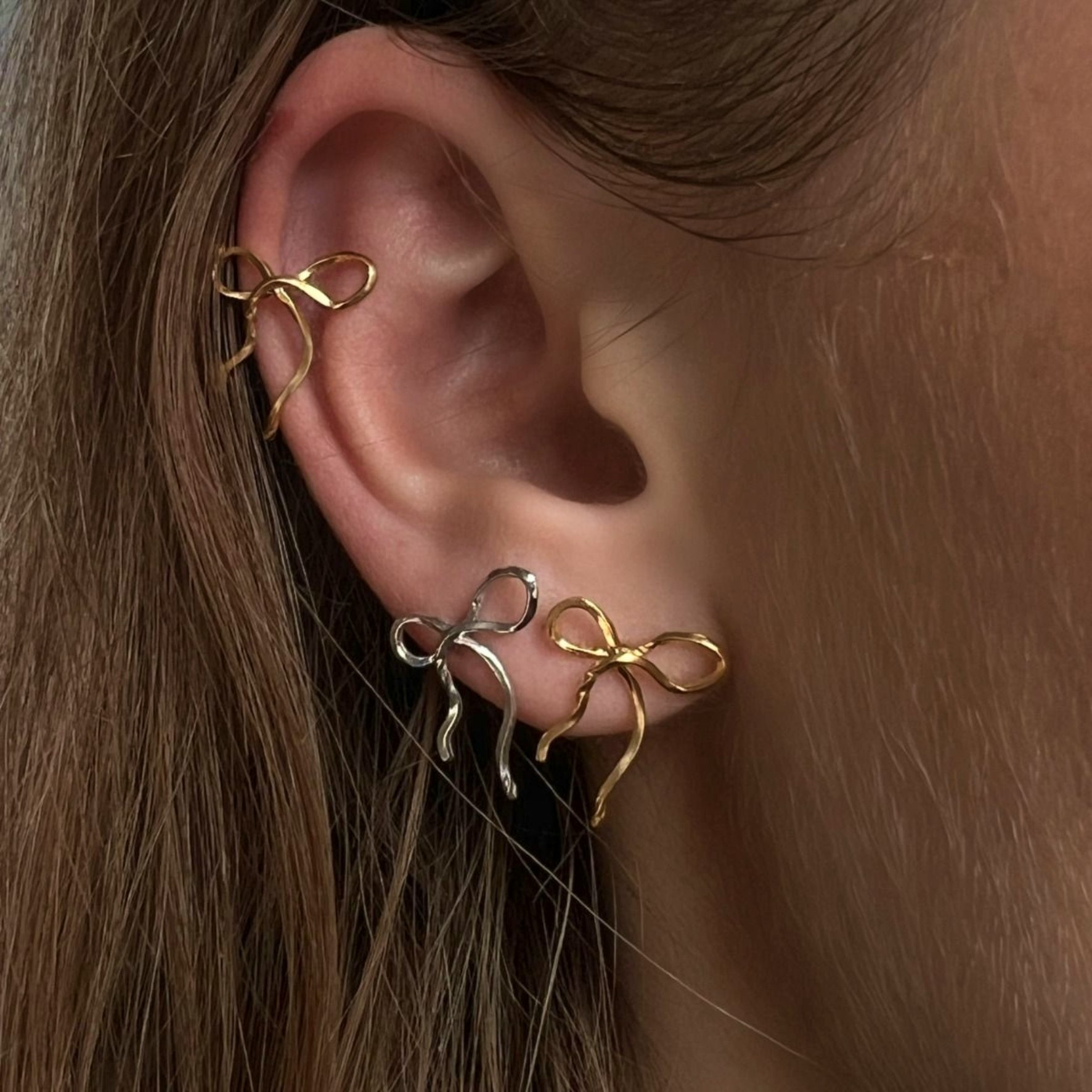 Flow Bow Earring fra STINE A Jewelry i Sølv Sterling 925