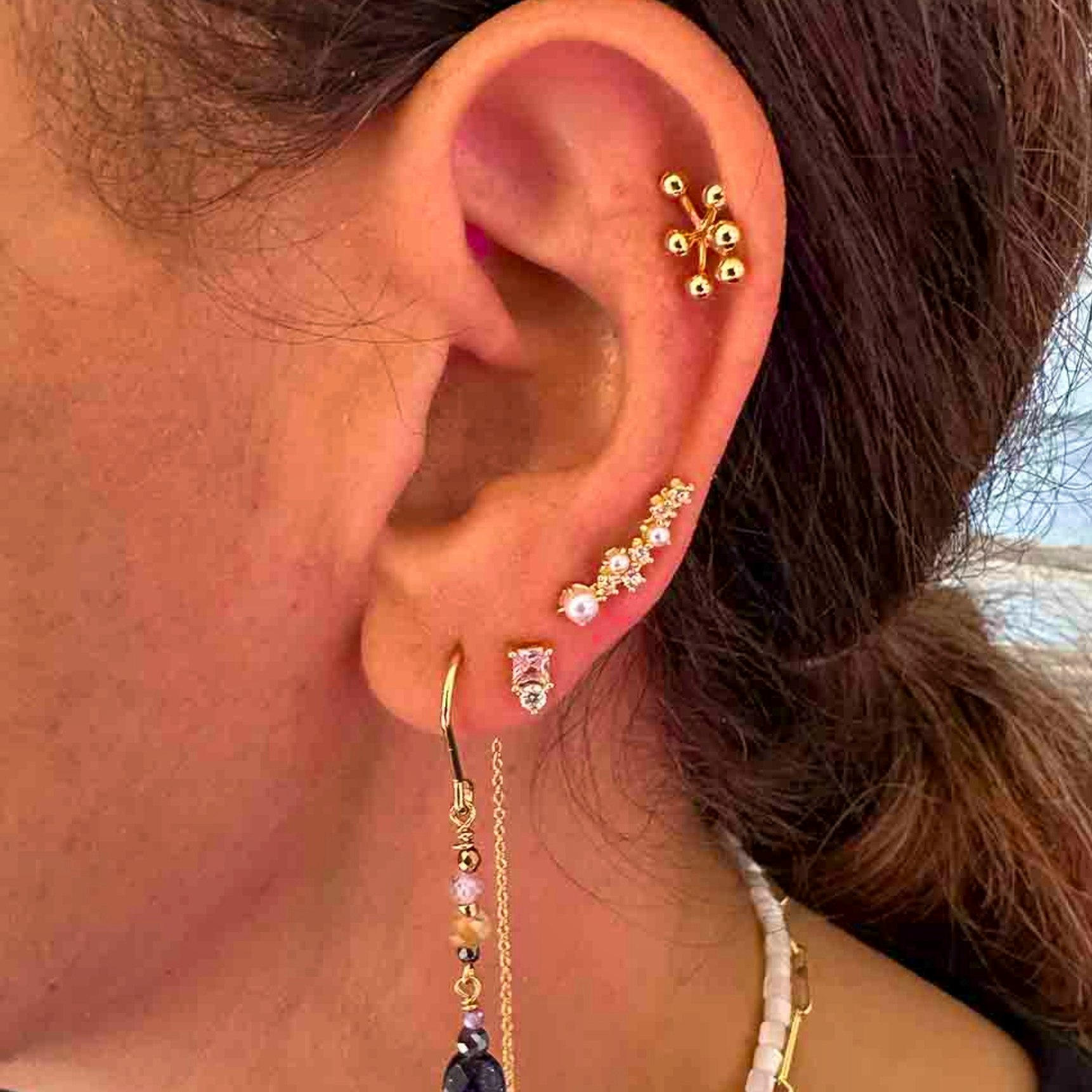 Stella Pearl Earrings fra Nuni Copenhagen i Forgylt-Sølv Sterling 925